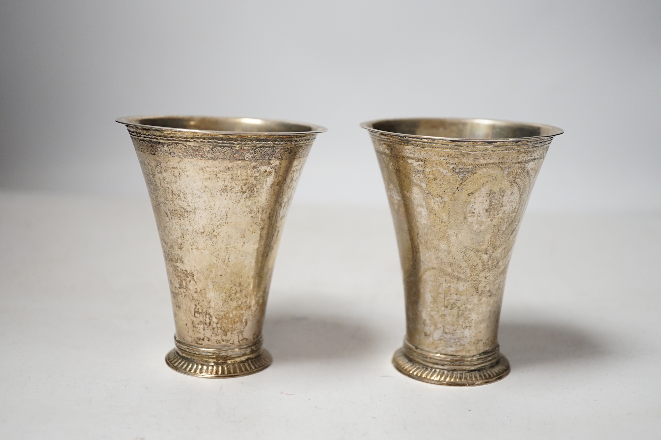 Two 19th century Swedish white metal beakers, of tapering form, one with maker's mark Seseman, 96mm.